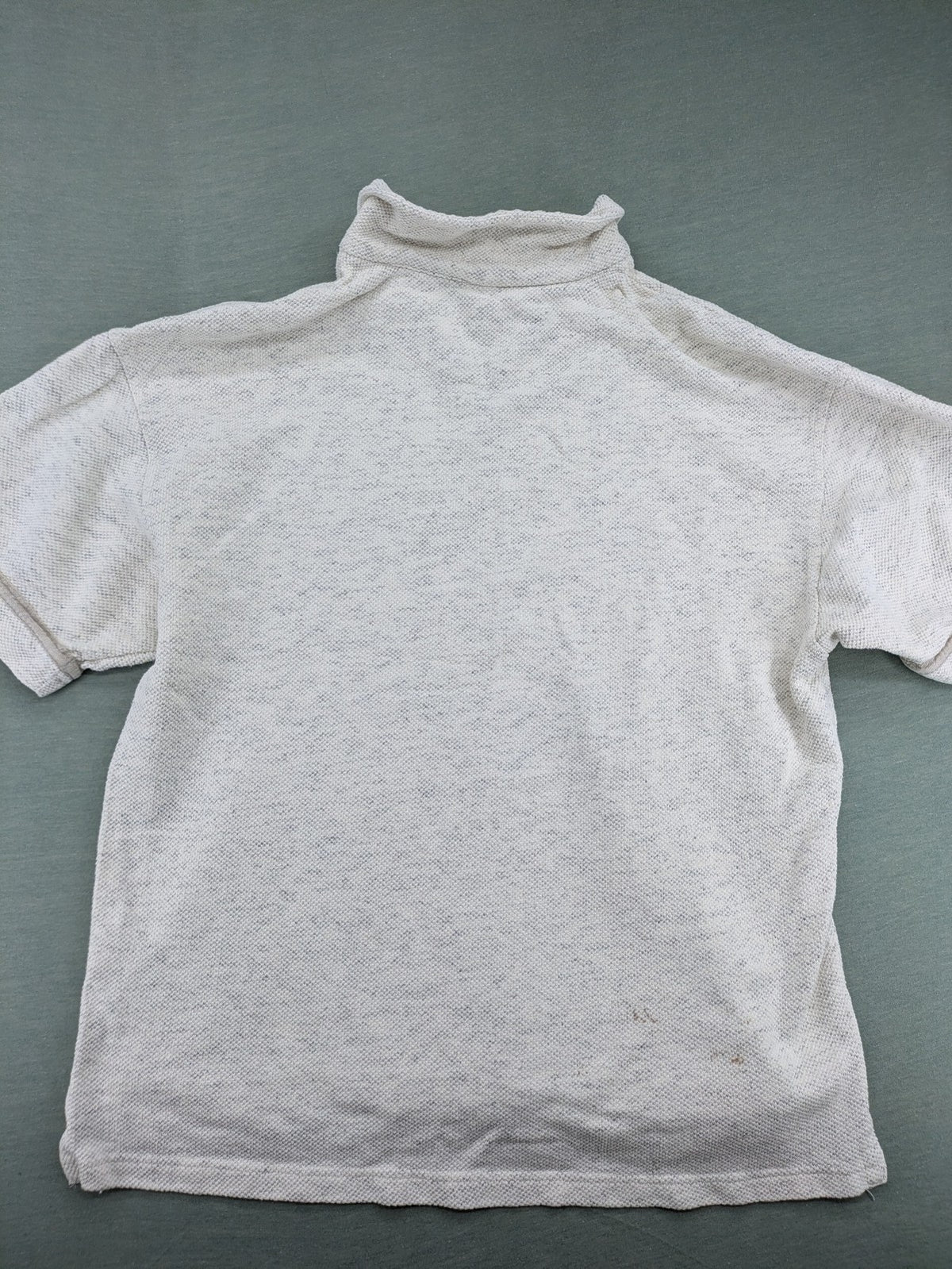 Mexx grey polo shirt with textured fabric and two-button placket.