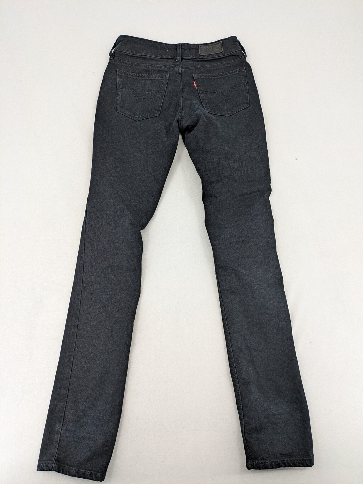 Levi's black slim fit jeans with classic 5-pocket design and zipper fly.