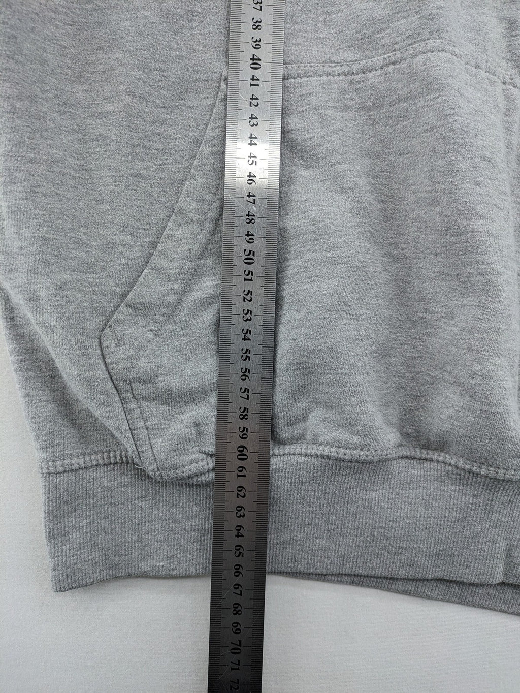 Uncle Sam grey hoodie with logo print, kangaroo pocket, and drawstring hood.