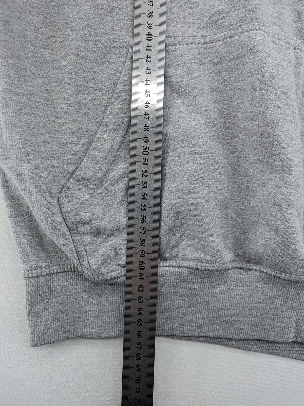 Uncle Sam grey hoodie with logo print, kangaroo pocket, and drawstring hood.