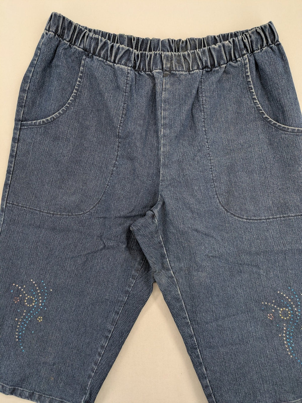 Denim & Co. blue capri jeans with elastic waistband and embellished rhinestones.