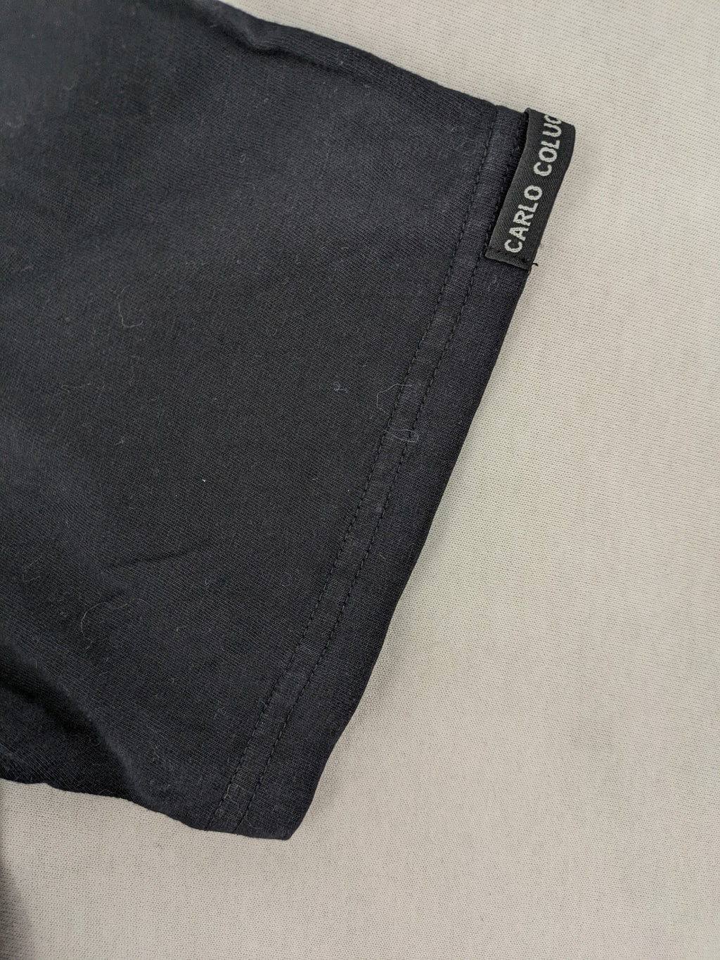 Carlo Colucci grey t-shirt with embroidered logo on chest and brand label details.