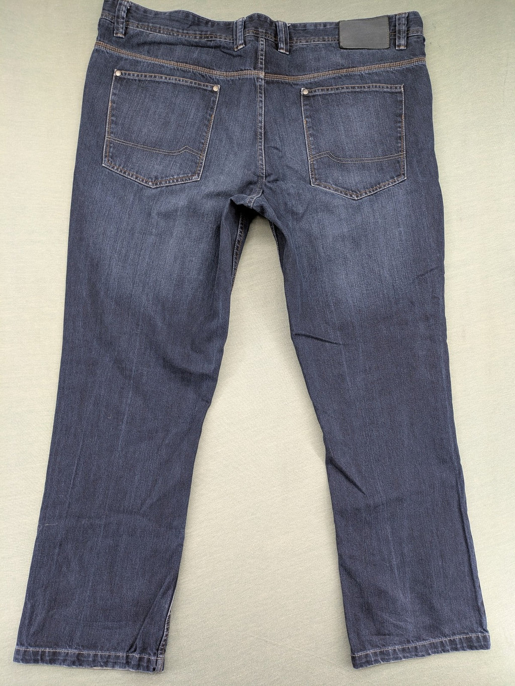 Canda blue straight jeans with five-pocket design and dark wash denim.