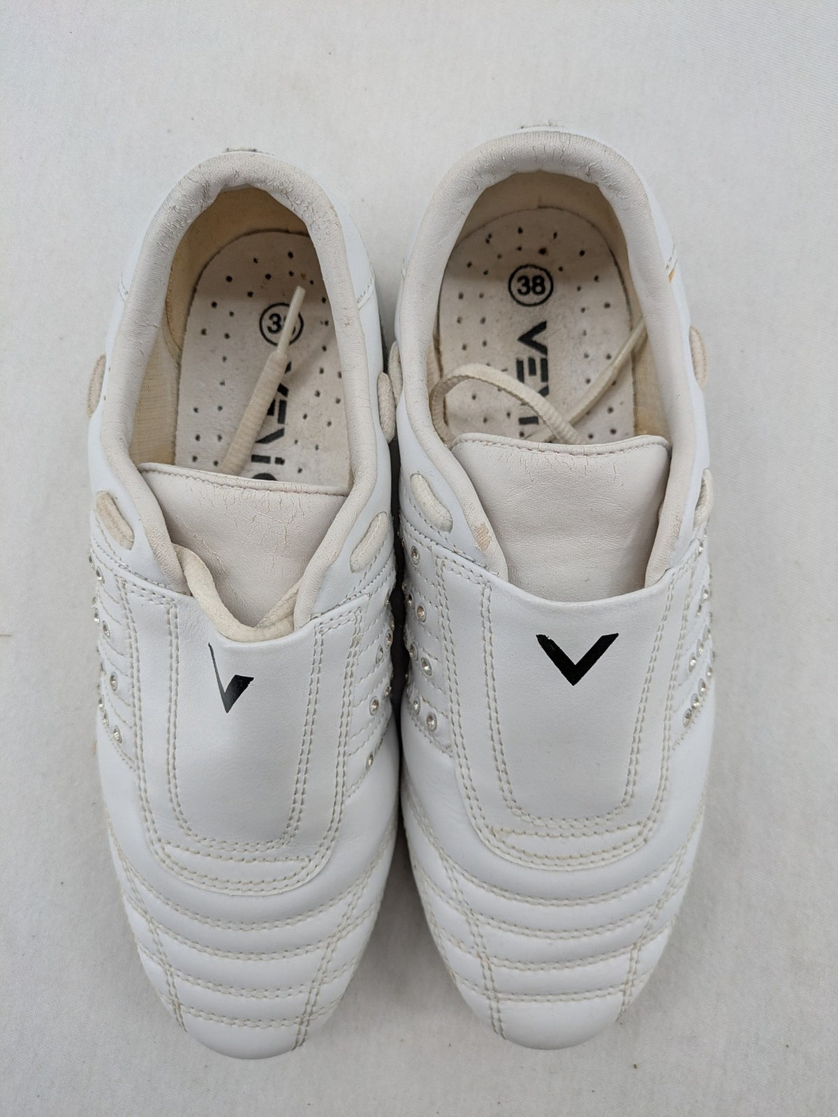 Venice low-top sneakers beige and white with rhinestone embellishments and unique sole pattern.