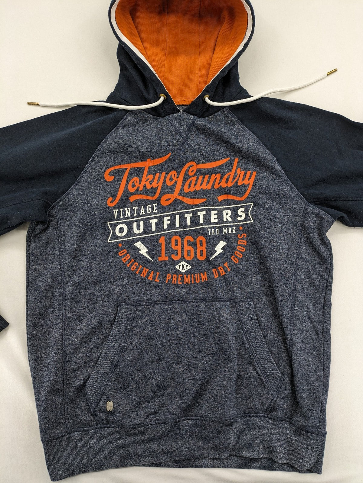 Tokyo Laundry orange zip-through hoodie with vintage graphic print and contrasting hood lining.
