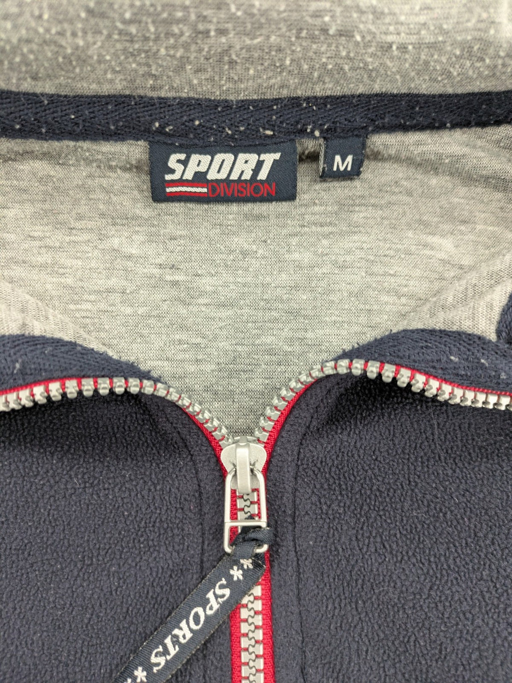 Sport Division turtle neck jumper dark blue fleece with quarter zip and chest pocket.