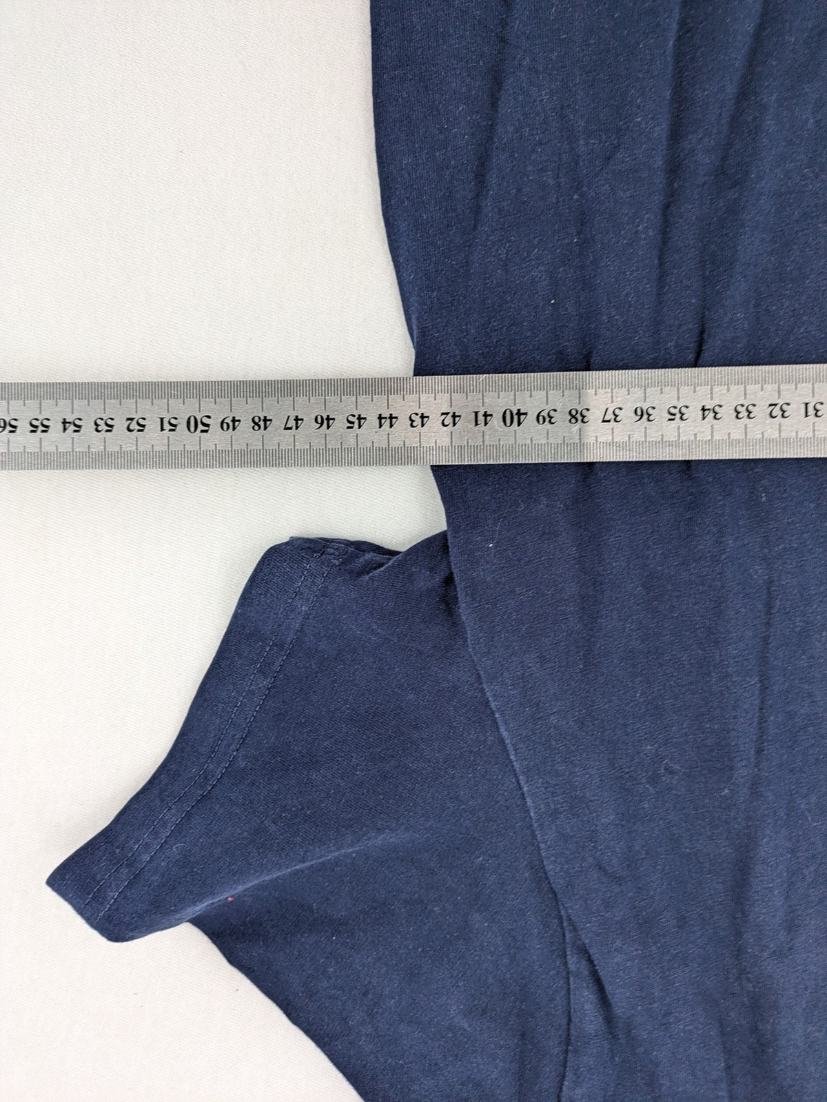 Review navy band t-shirt with "Never Established" logo print, 100% cotton.
