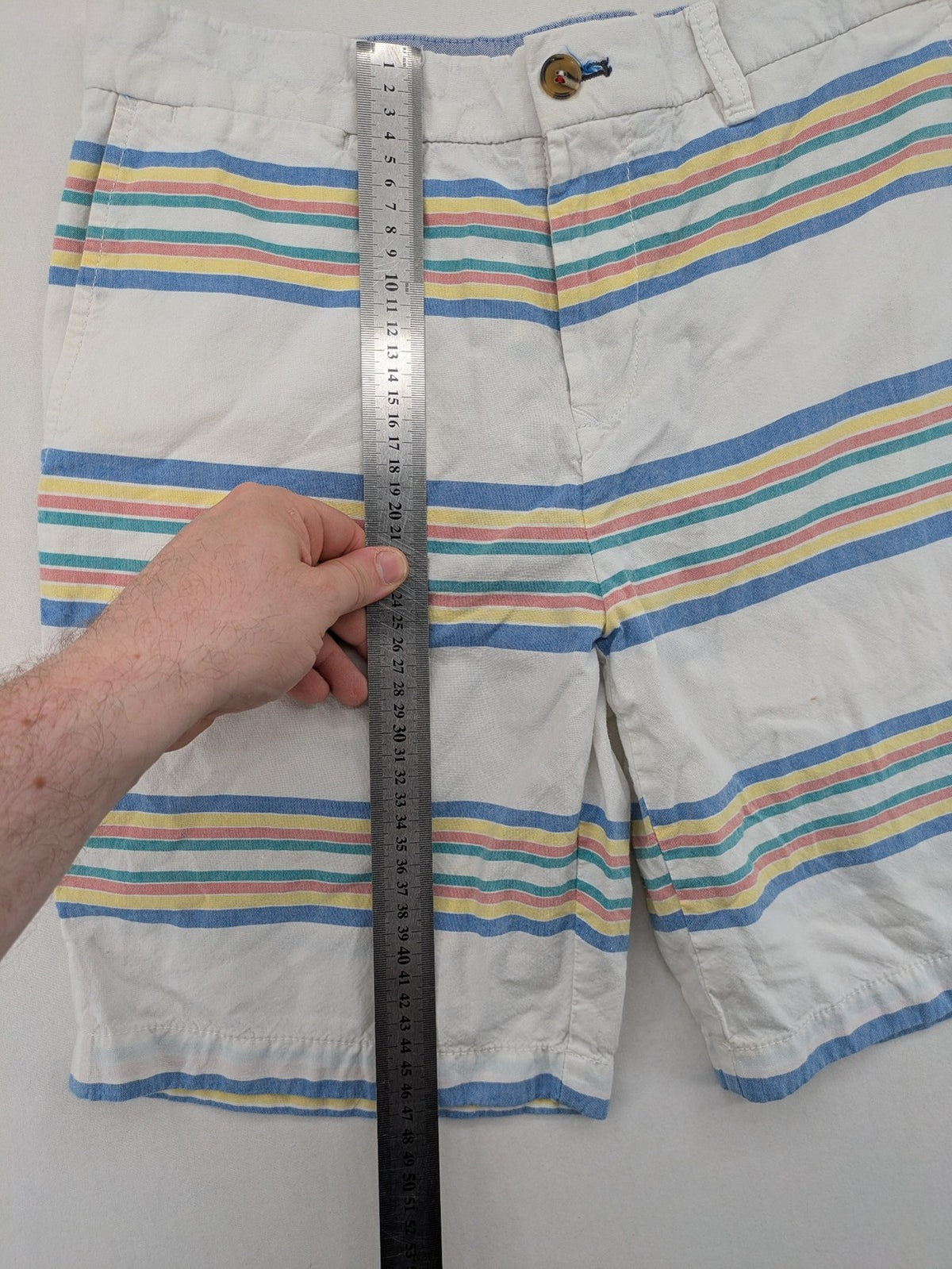 Tommy Hilfiger chino shorts blue and green striped pattern with iconic flag logo.