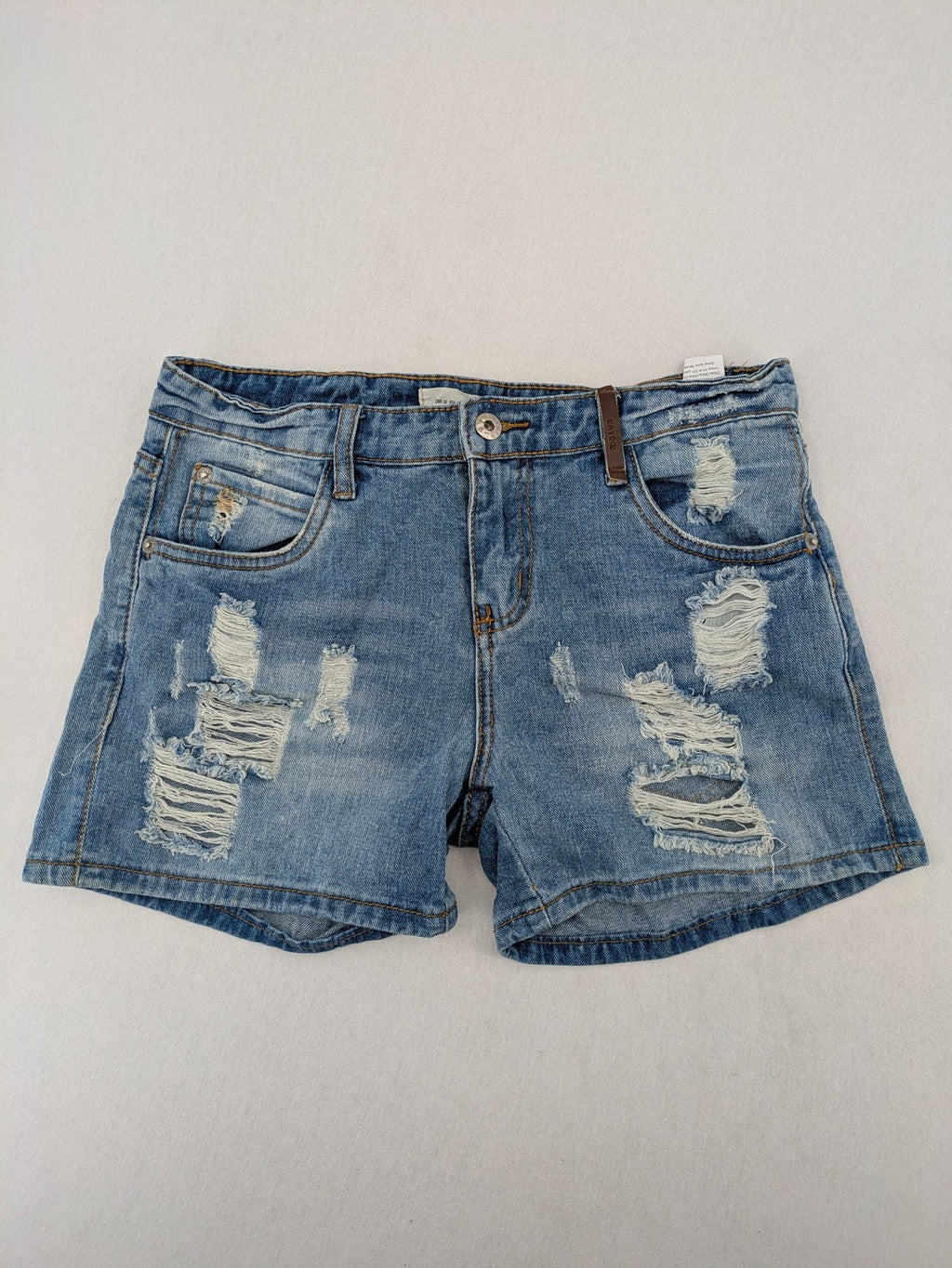 Daysie blue boyfriend jeans shorts with distressed rips and classic 5-pocket design.
