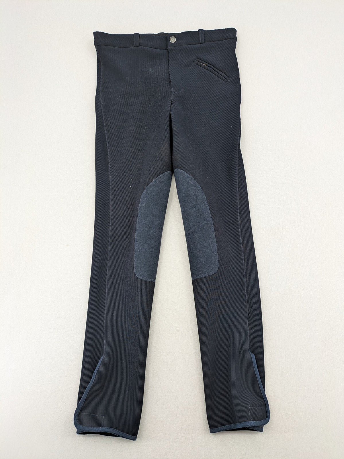 Cavalliero blue youth riding pants with knee patches and ribbed microfiber fabric.