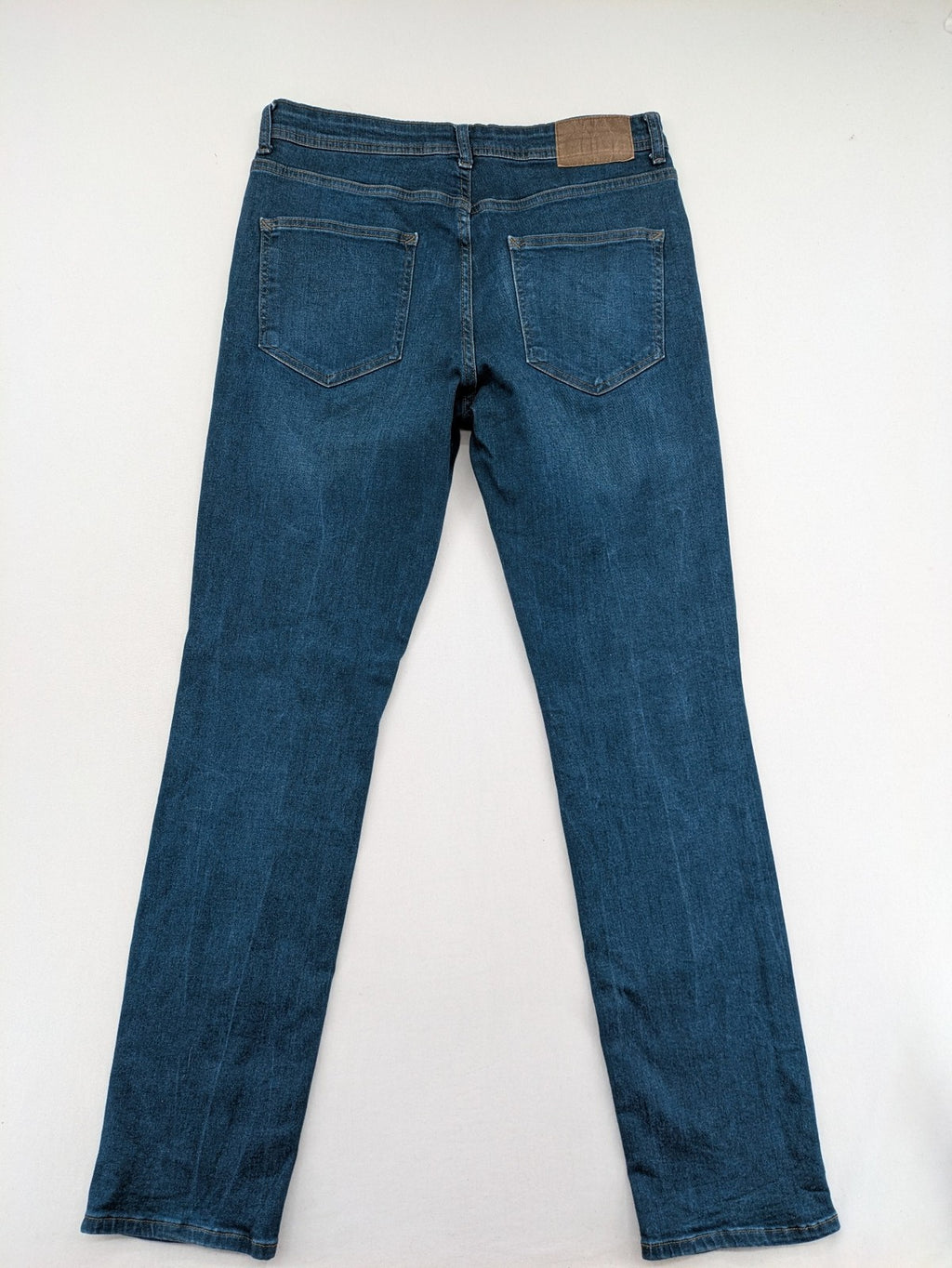 Denim & Co. blue straight fit jeans, classic 5-pocket design, button fly, cotton blend.