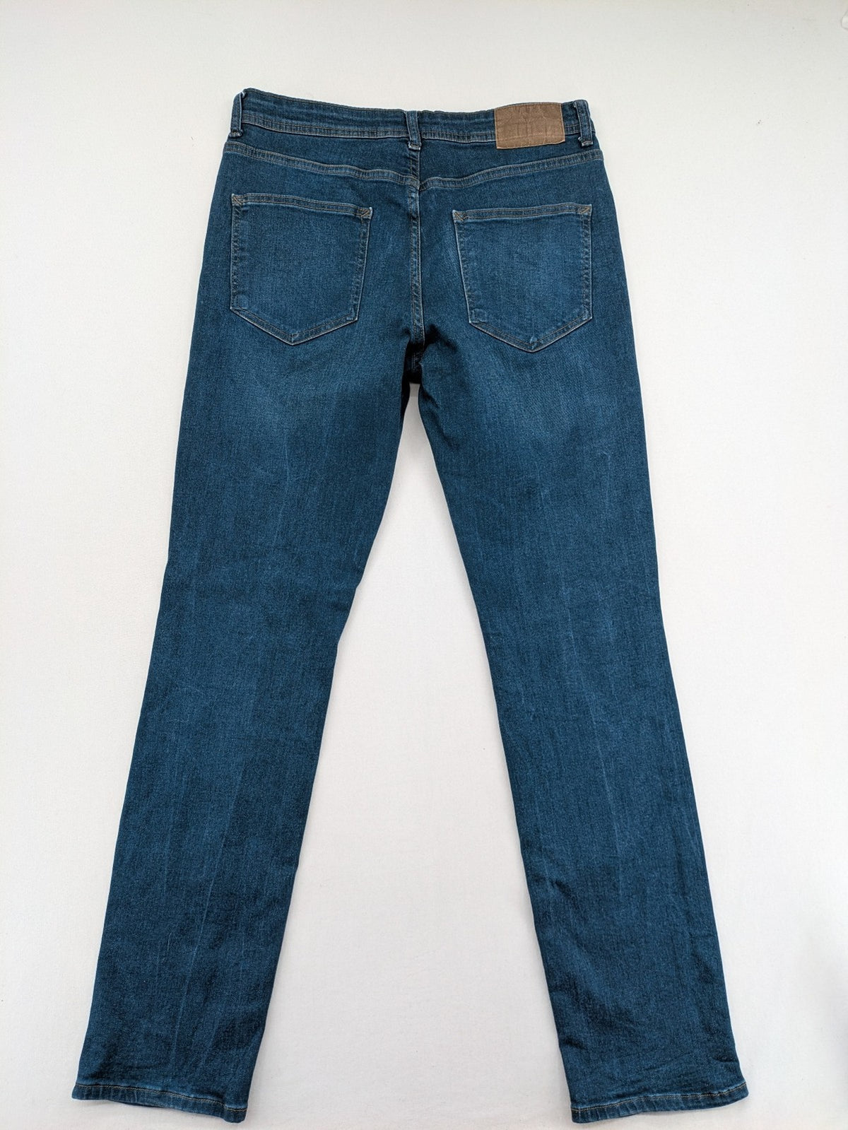 Denim & Co. blue straight fit jeans, classic 5-pocket design, button fly, cotton blend.