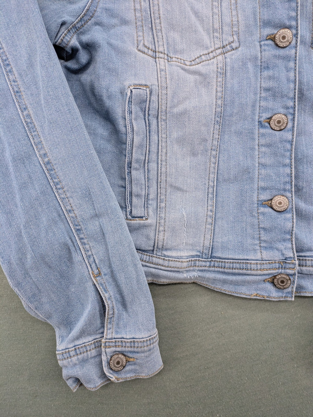 Pimkie blue denim jacket with classic cut, button placket, and two chest pockets.