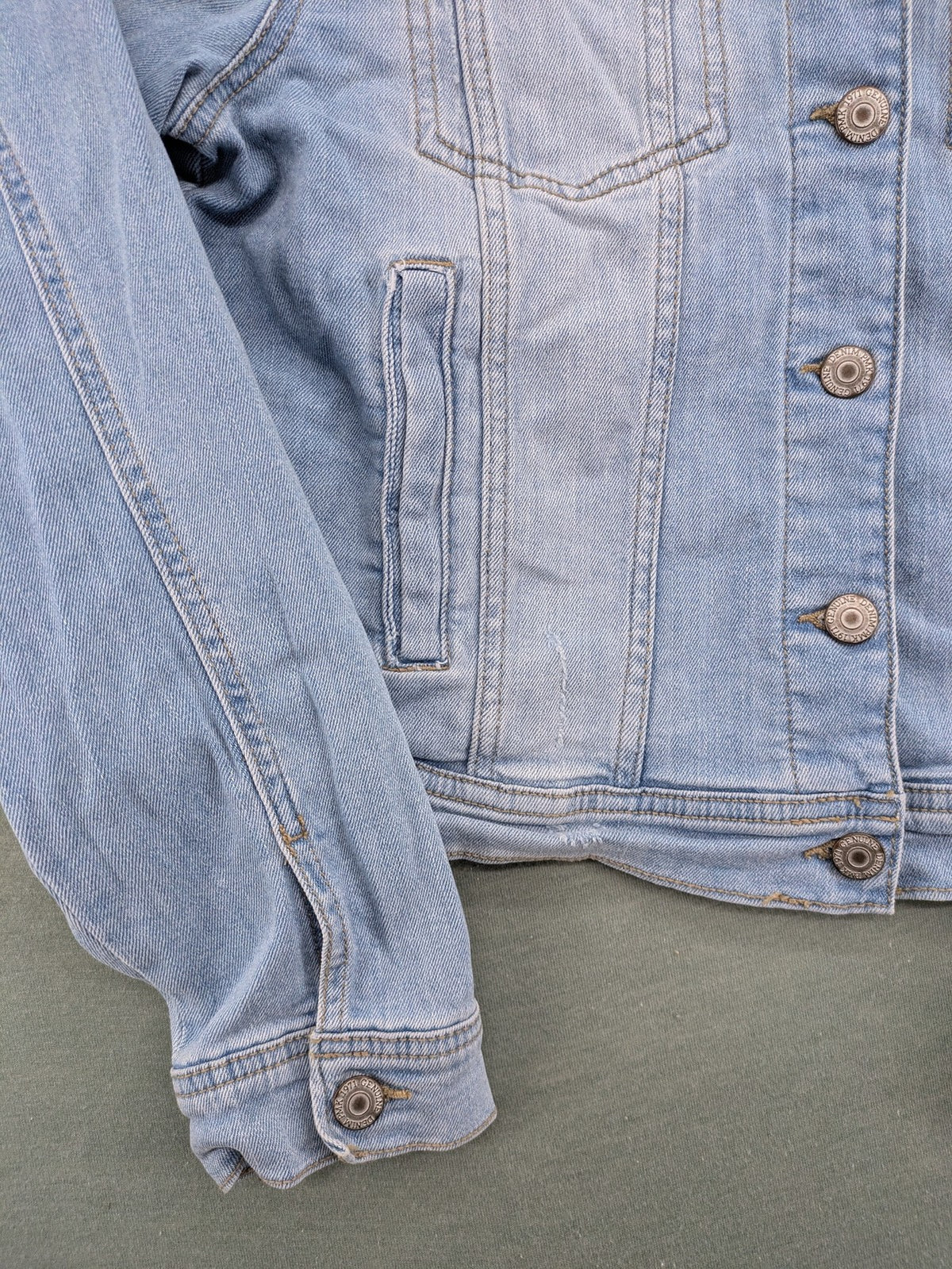 Pimkie blue denim jacket with classic cut, button placket, and two chest pockets.