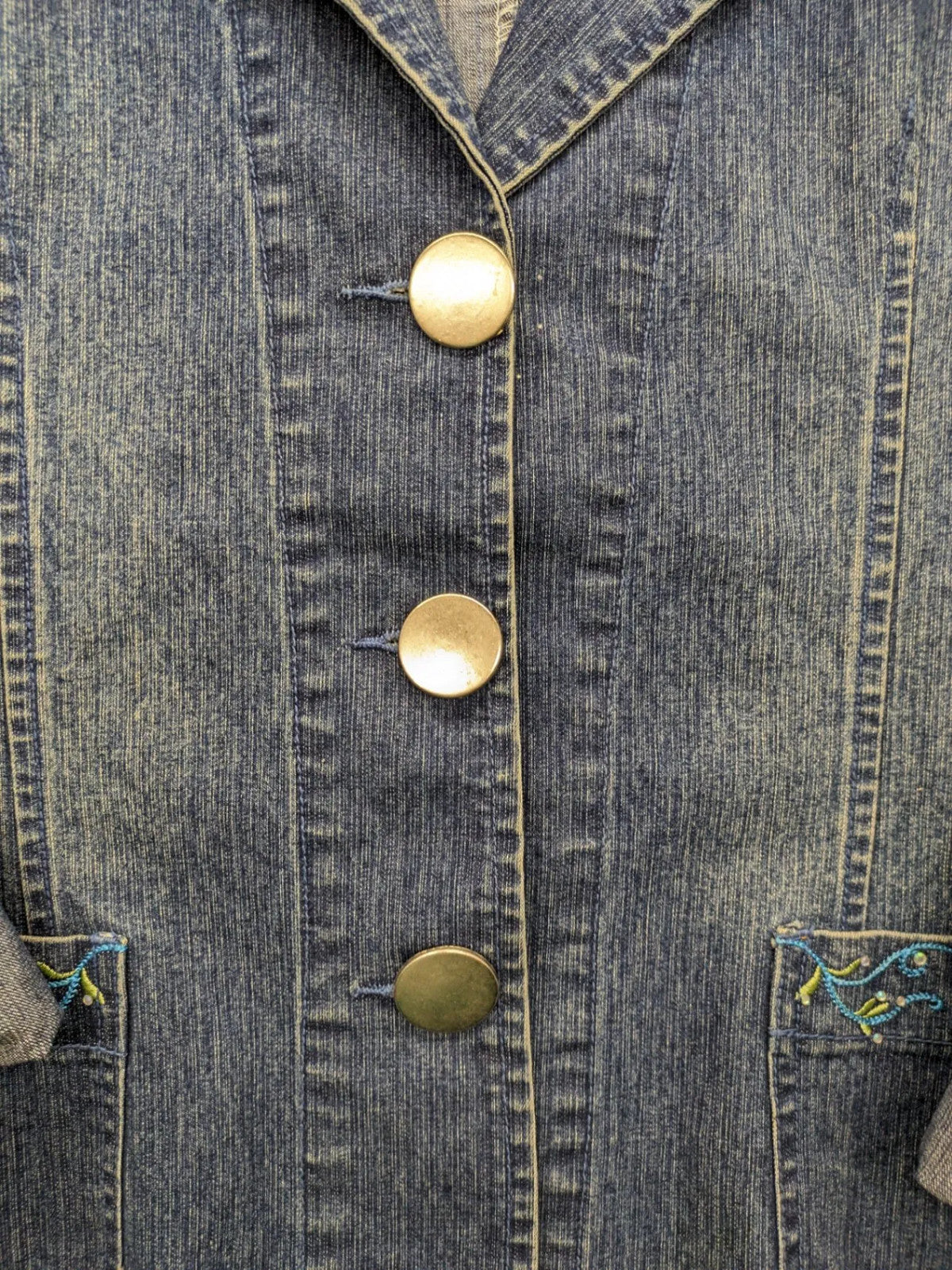 Zala blue denim blazer jacket with embroidered details and classic button closure.