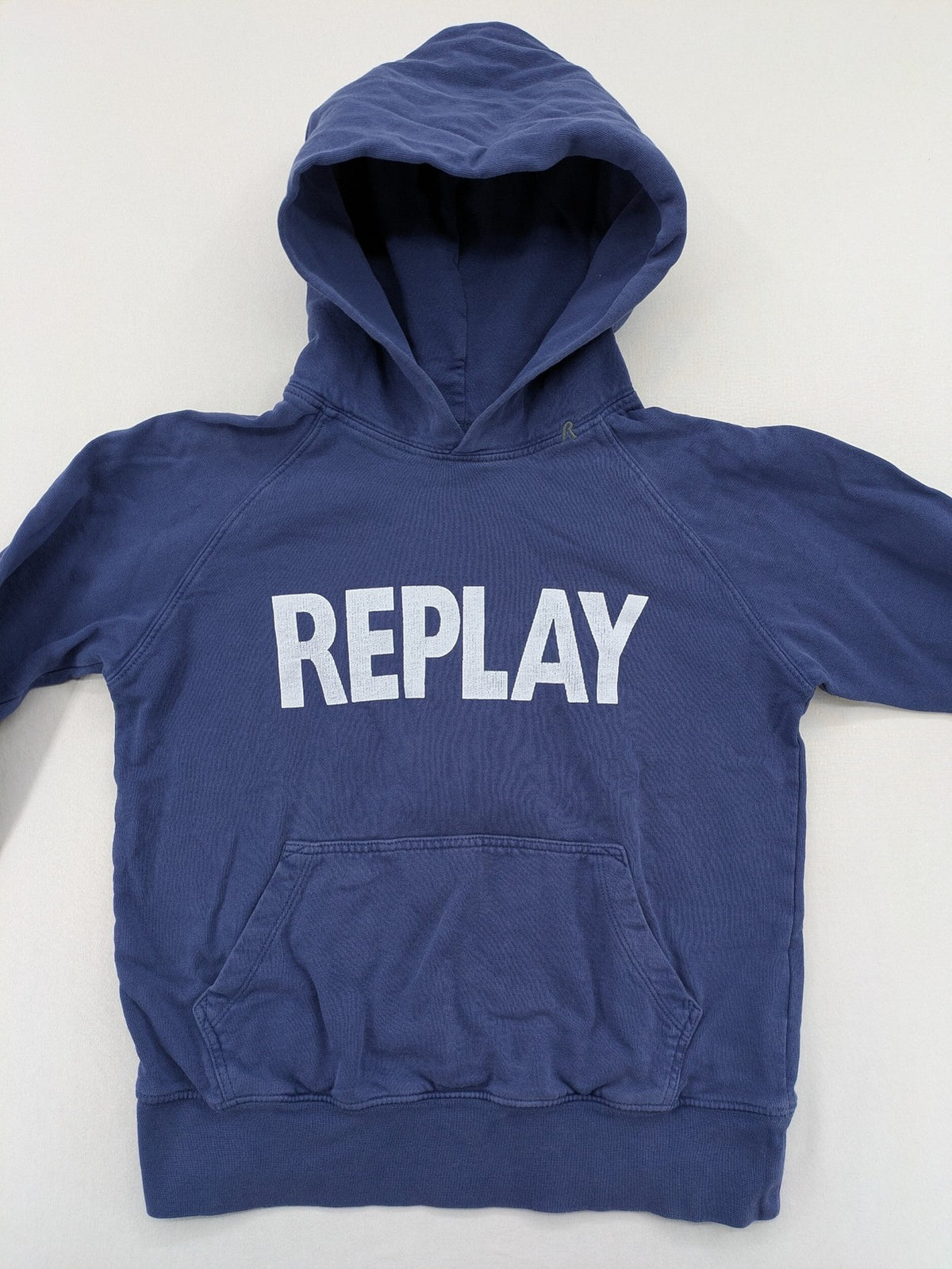 Replay blue turtle neck jumper with large logo print and kangaroo pocket, 100% cotton.