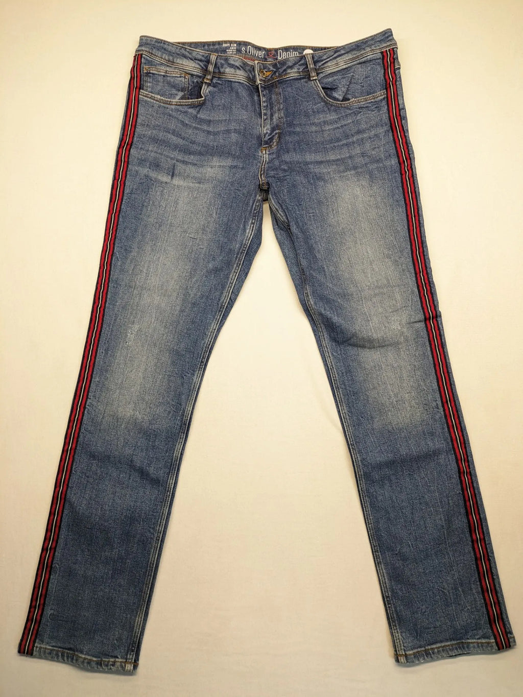 s.Oliver blue straight jeans with red and white side stripes, soft cotton blend material
