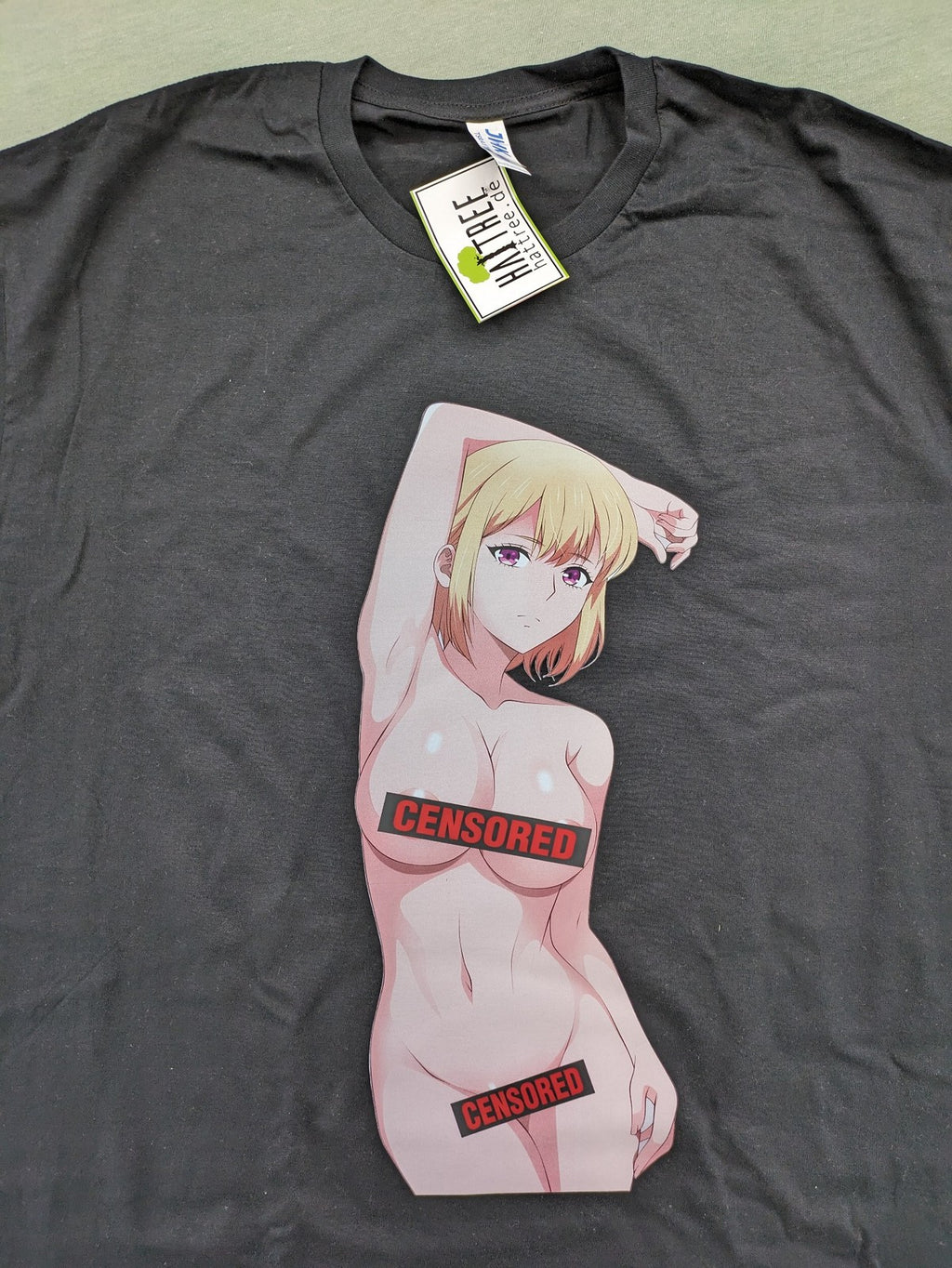 JHK multi graphic t-shirt featuring anime girl with "Censored" bars, 100% cotton.