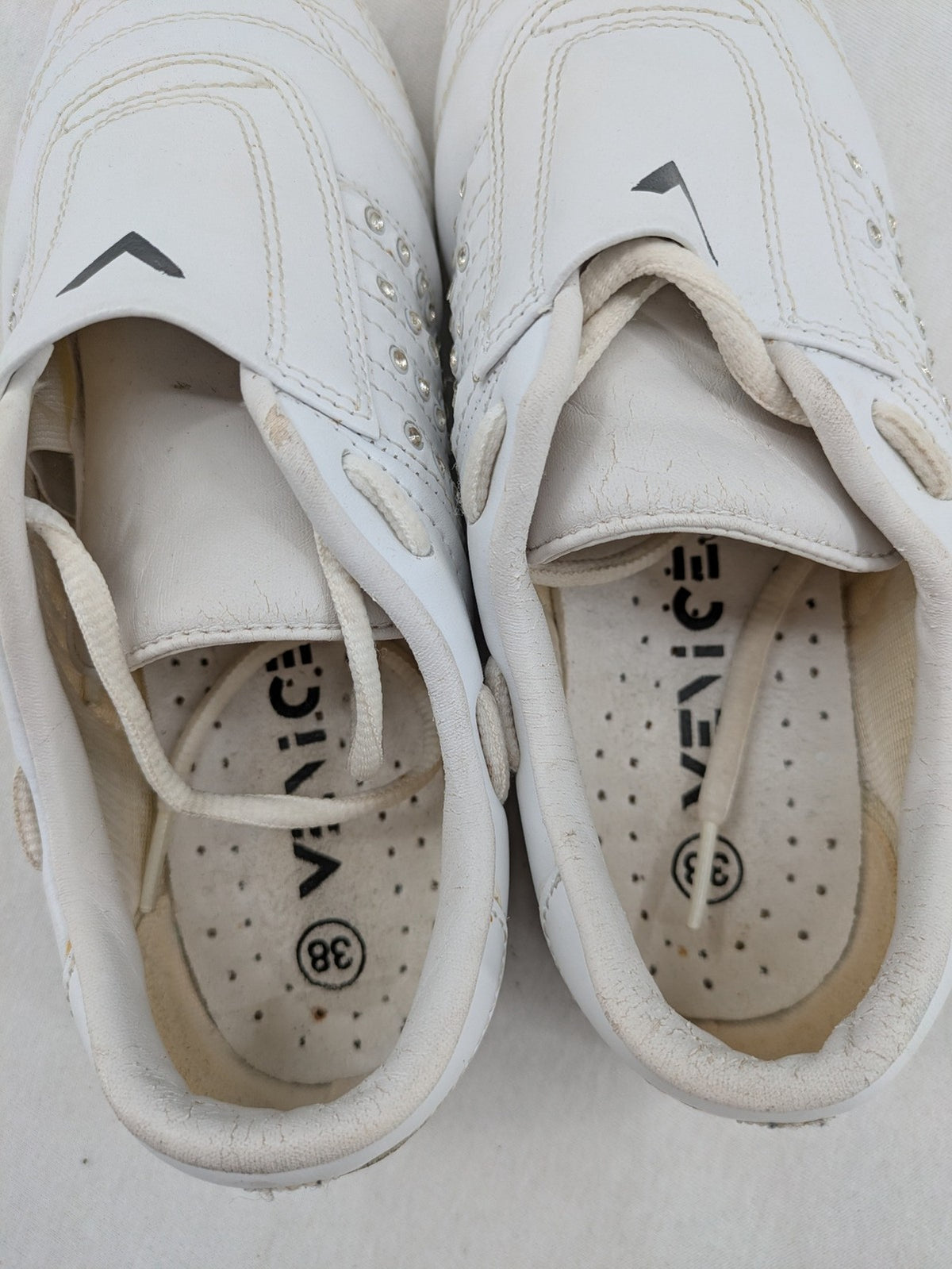 Venice low-top sneakers beige and white with rhinestone embellishments and unique sole pattern.