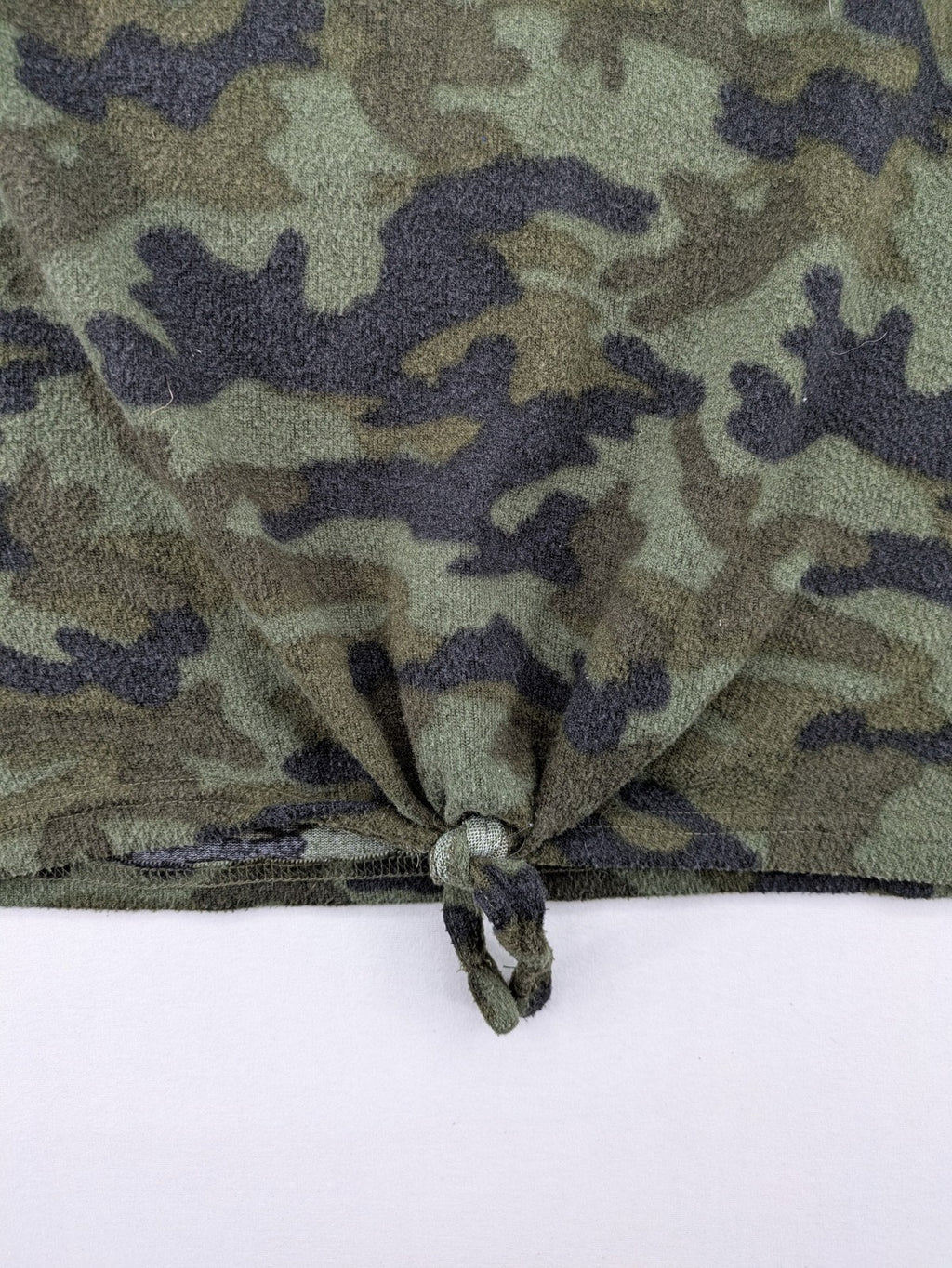 YFK turtle neck jumper multi camouflage print with sequined "COOL MOOD Today" graphic.