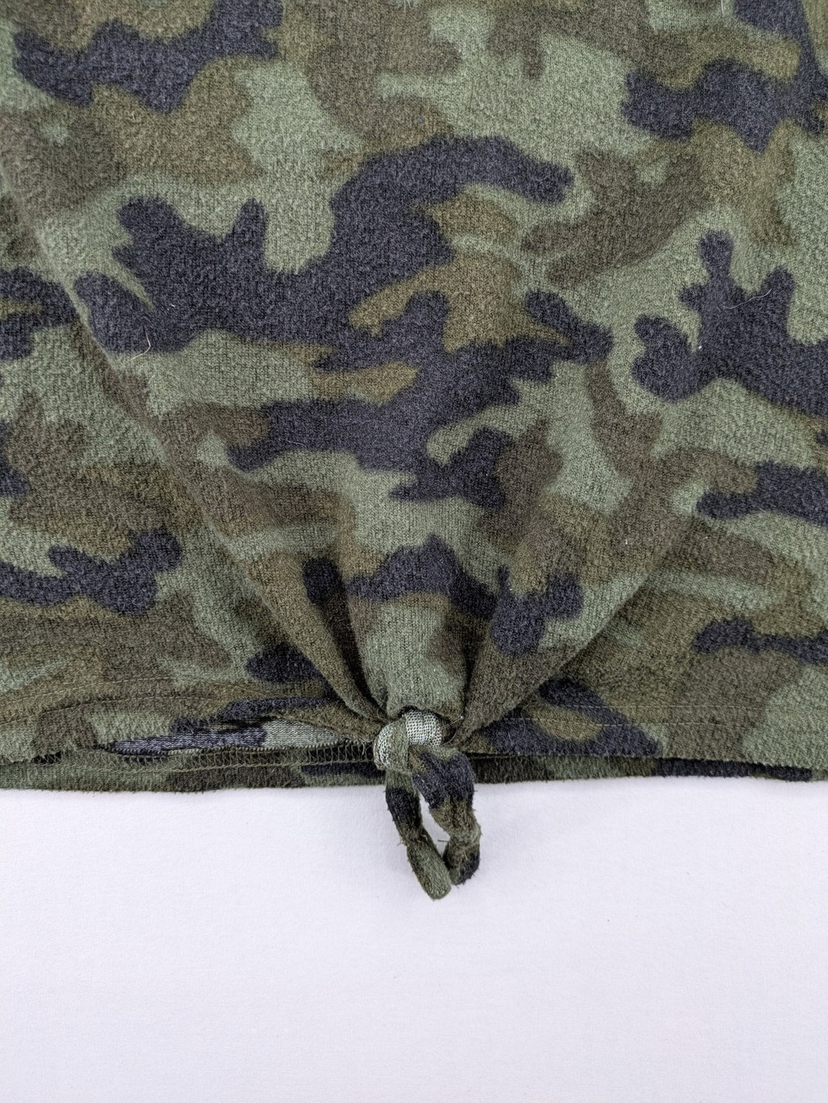 YFK turtle neck jumper multi camouflage print with sequined "COOL MOOD Today" graphic.