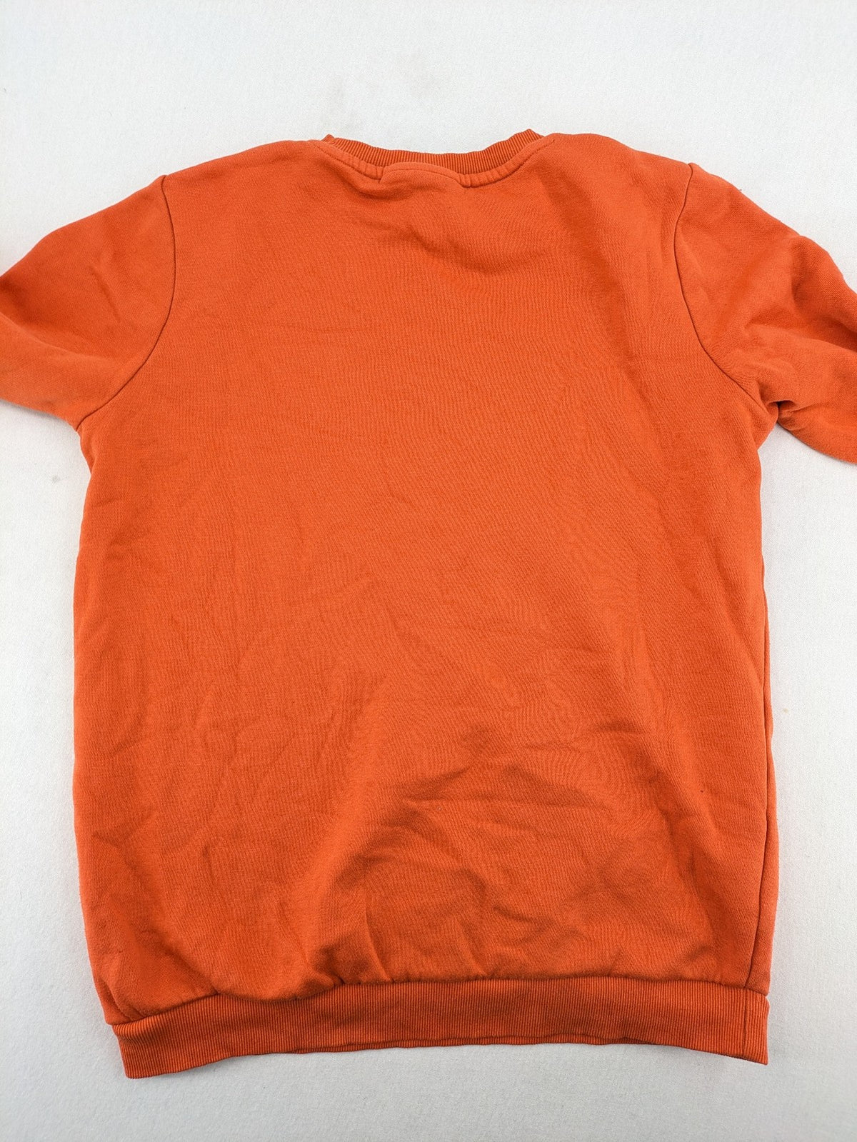 Naruto Shippuden orange sweatshirt featuring vibrant Naruto Uzumaki graphic print, classic crew neck.