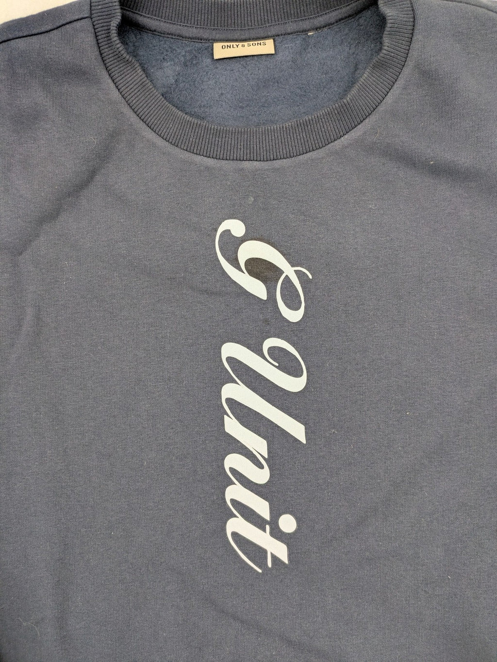 G-Unit navy turtle neck jumper with vertical logo graphic and soft fleece interior.
