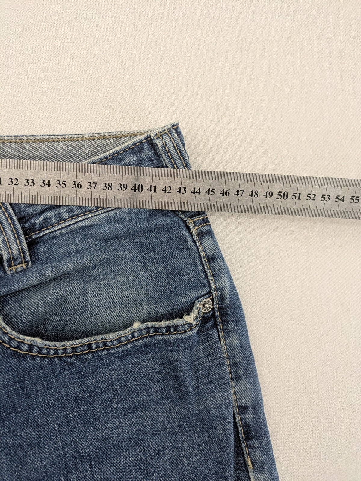 Joker blue straight leg jeans with double saddle stitched detail and classic denim wash.