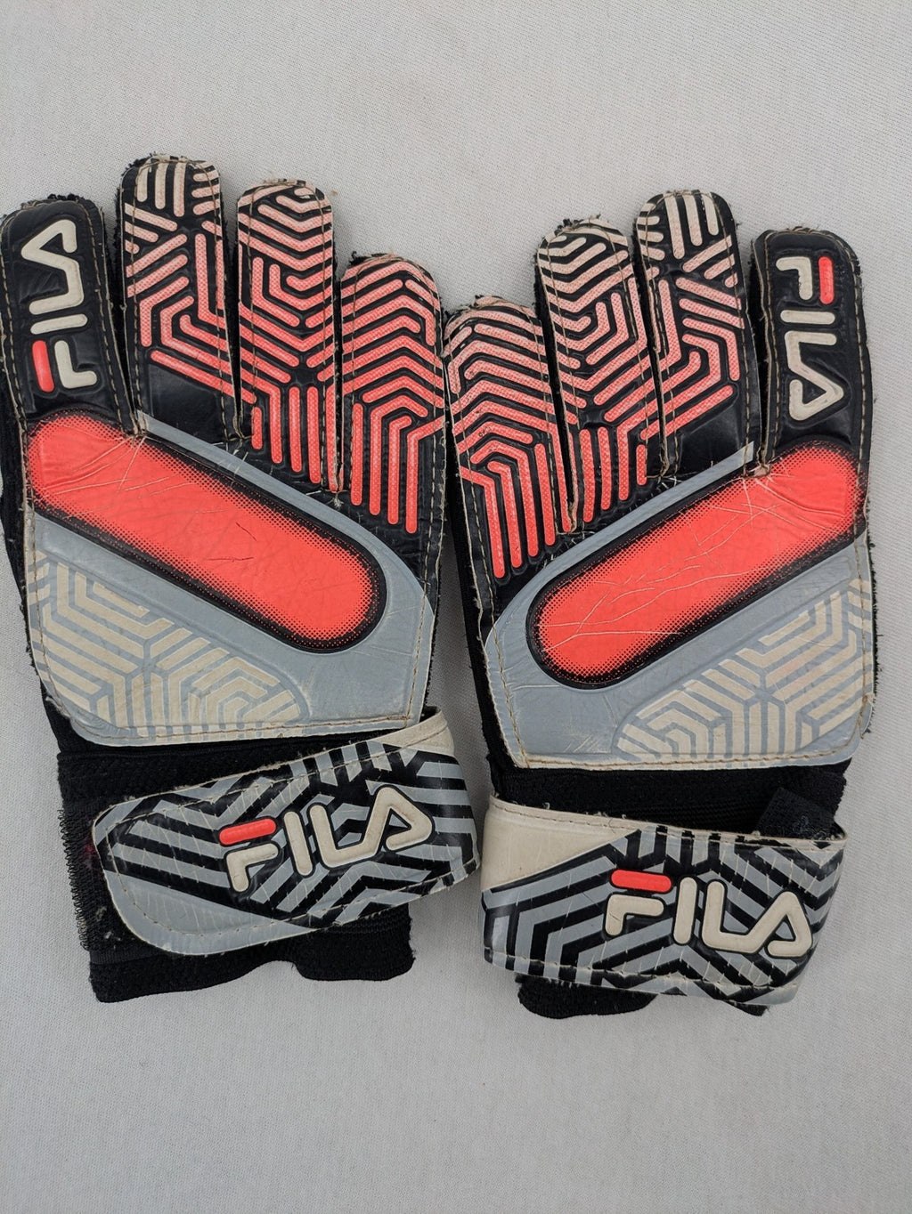 Fila soccer gloves black grey red geometric pattern padded backhand