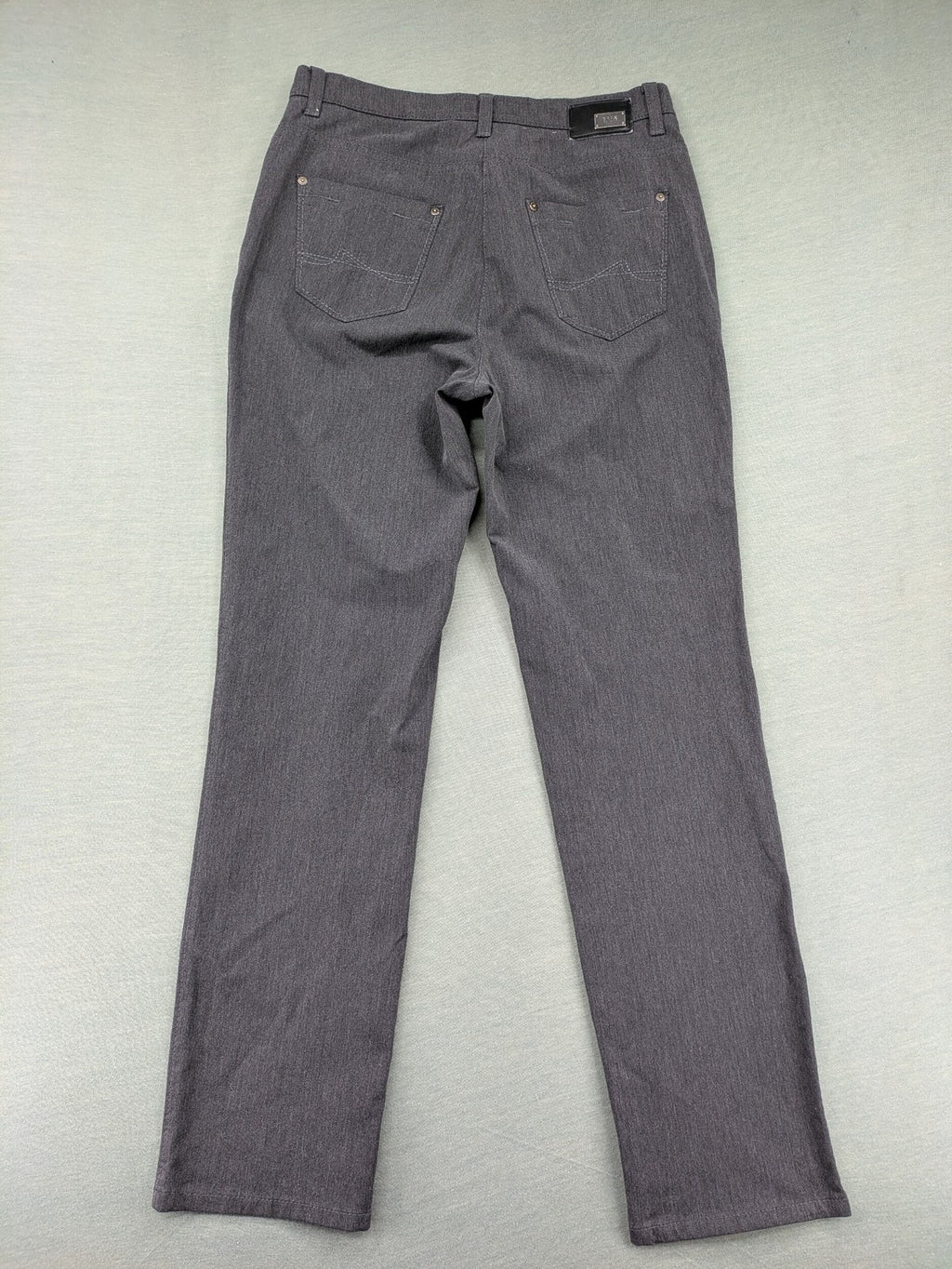 BRAX pants pink 5-pocket design with stretch material and logo detail.