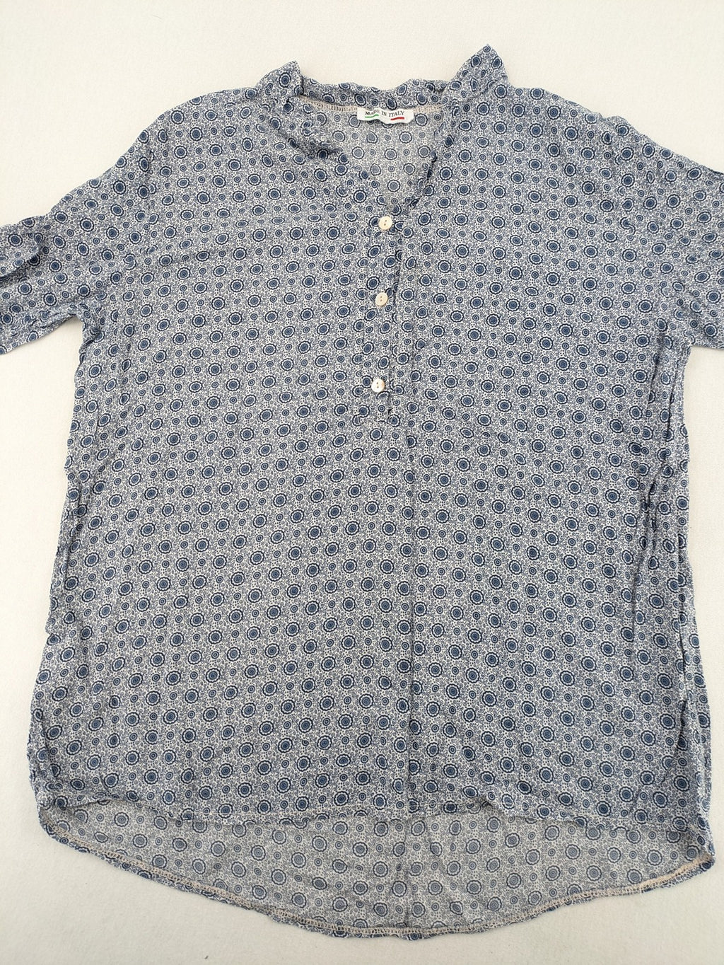 M/L blue and grey tunic top with geometric pattern and stand-up collar.