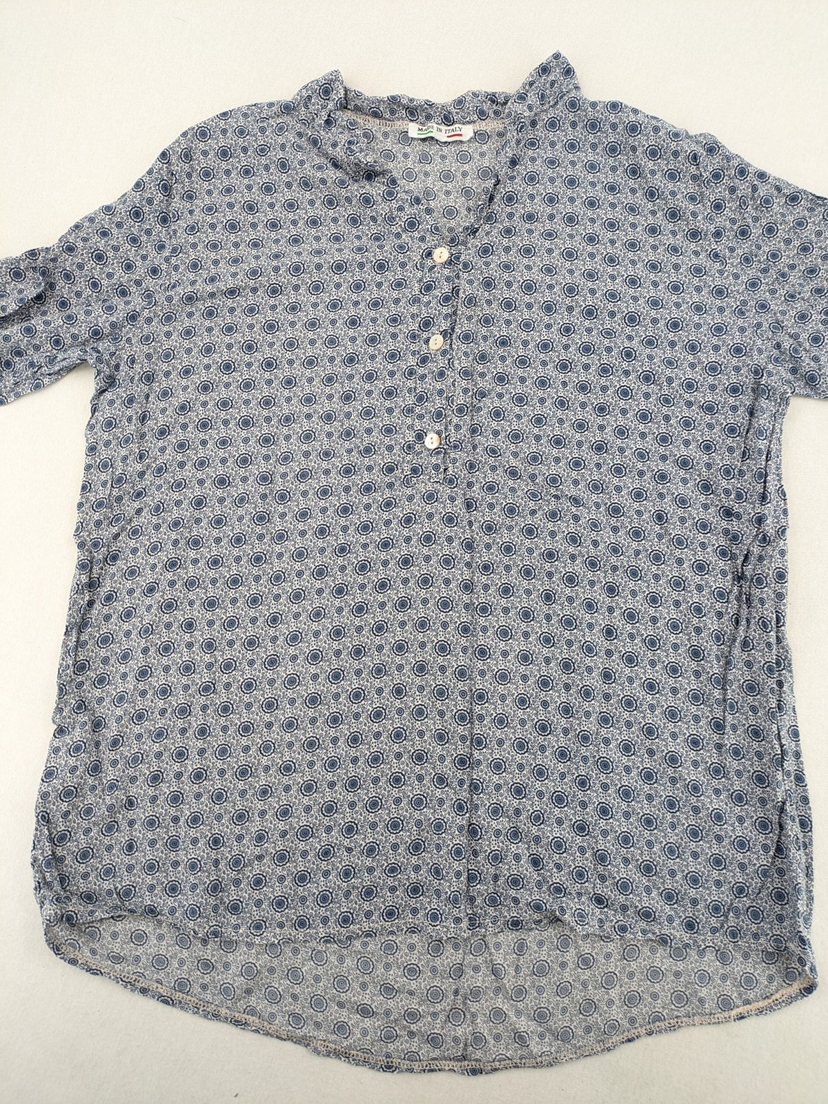 M/L blue and grey tunic top with geometric pattern and stand-up collar.