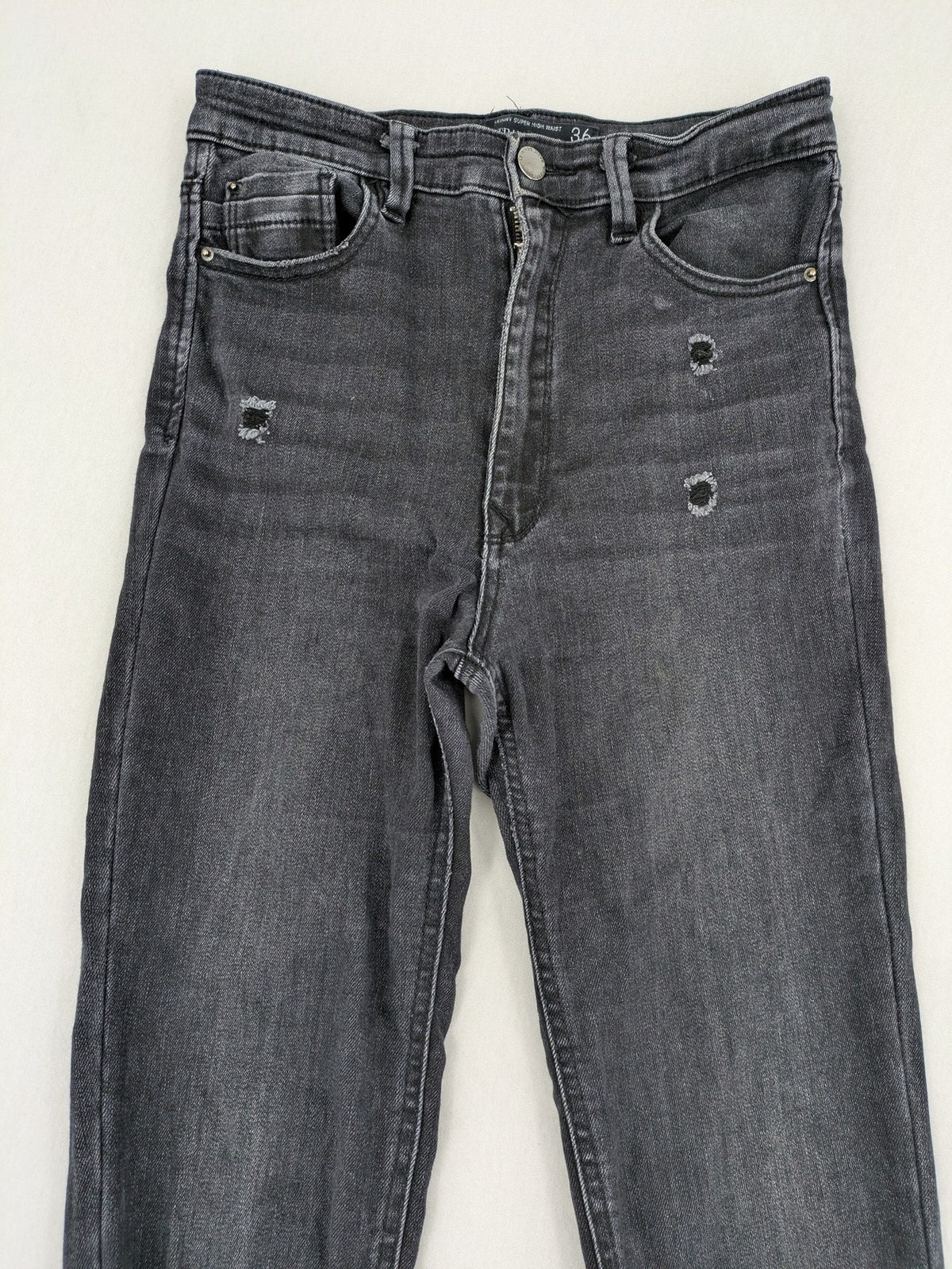 Stradivarius grey skinny jeans super high waist distressed with classic five-pocket design.