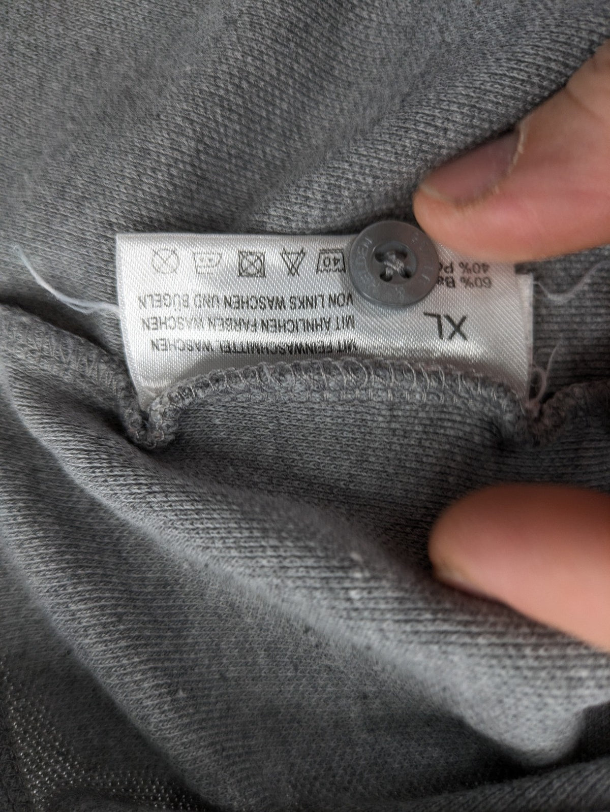 Götter & Helden grey polo shirt with "Gods Favorite" embroidery and contrasting collar details.
