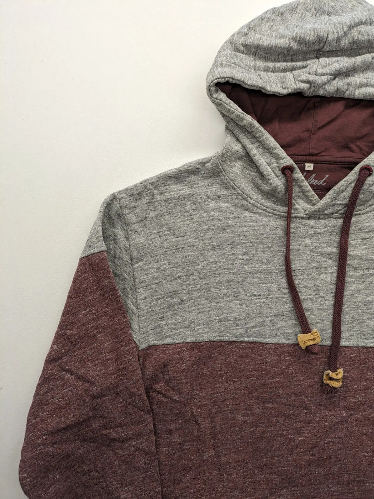 Bleed turtle neck jumper grey burgundy colorblock design with adjustable hood and kangaroo pocket.