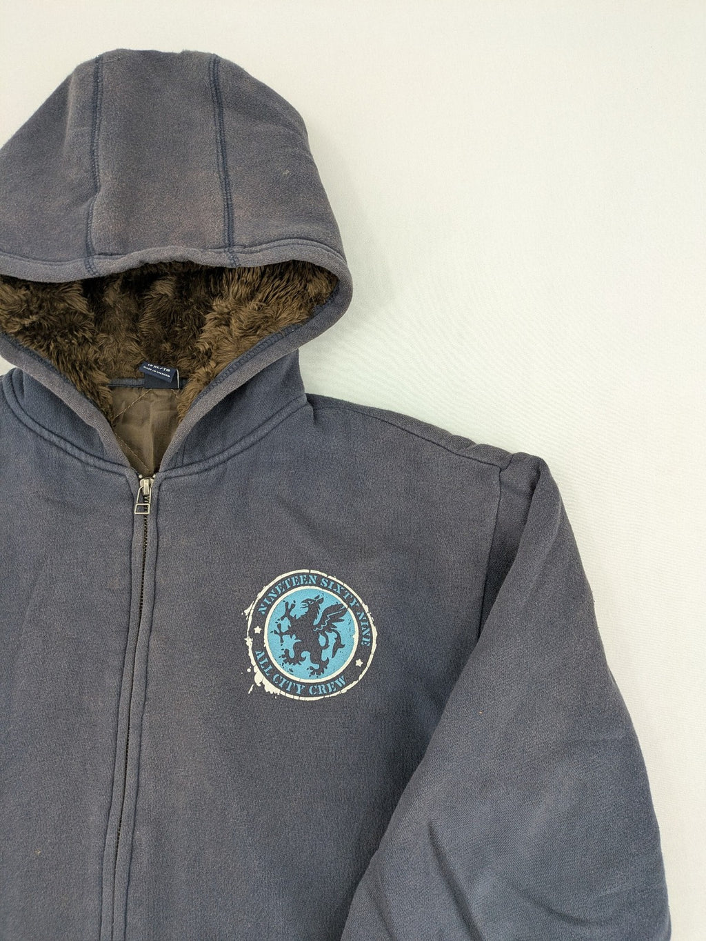 Gap Kids blue and grey zip-up hoodie with "All City Crew" logo and Sherpa lining.