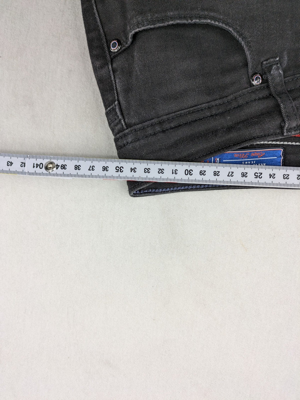 Kaporal black slim fit jeans with classic 5-pocket design and stretch denim material.