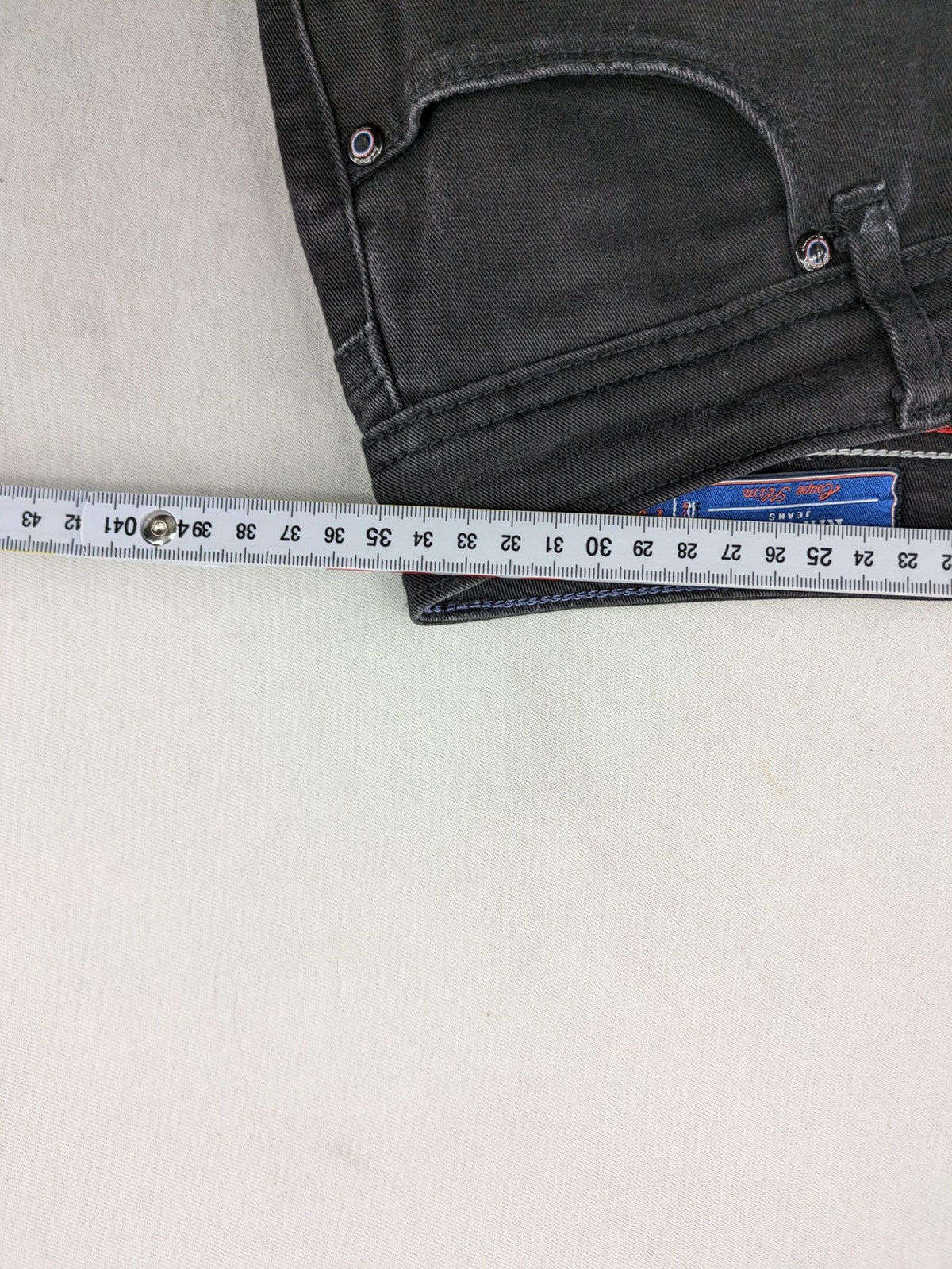 Kaporal black slim fit jeans with classic 5-pocket design and stretch denim material.