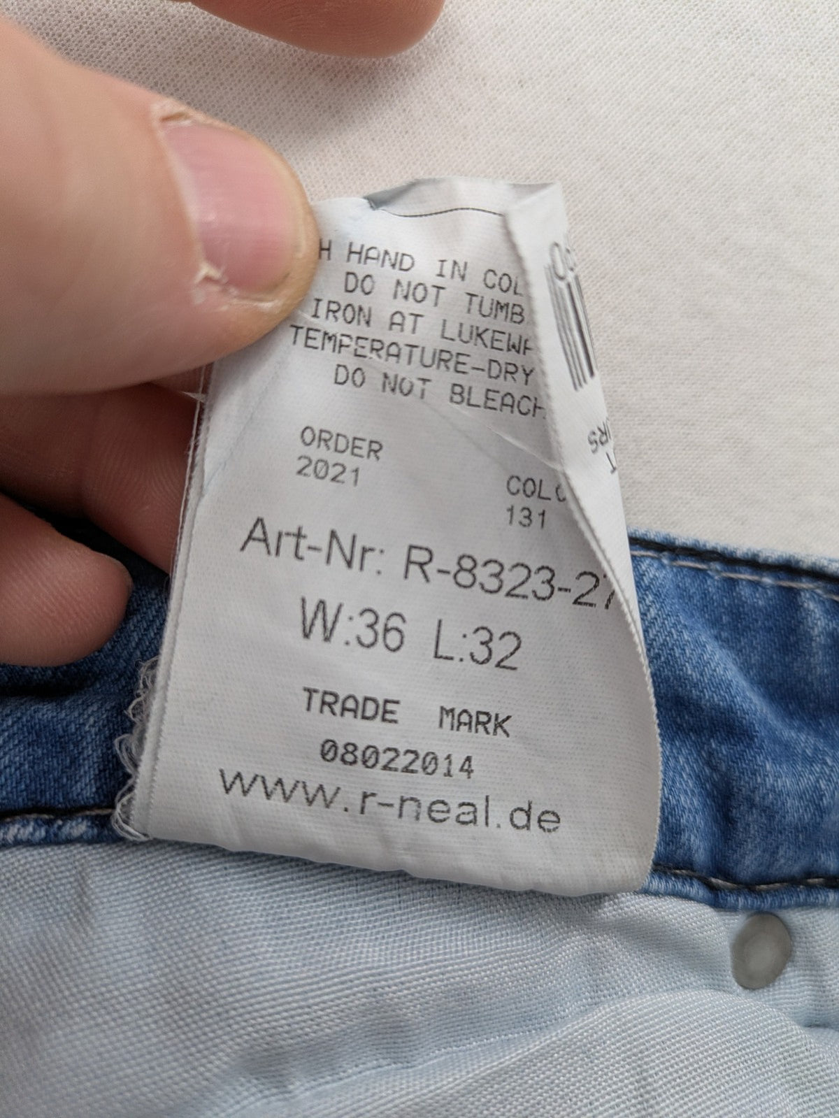 R-Neal blue straight jeans with red-white contrast stitching and classic 5-pocket design.