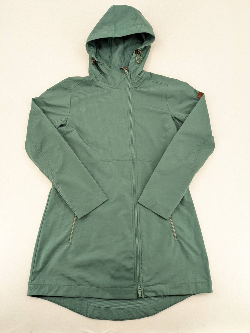 Frilufts green softshell jacket with hood, longline design, durable zipper, practical zip pockets.