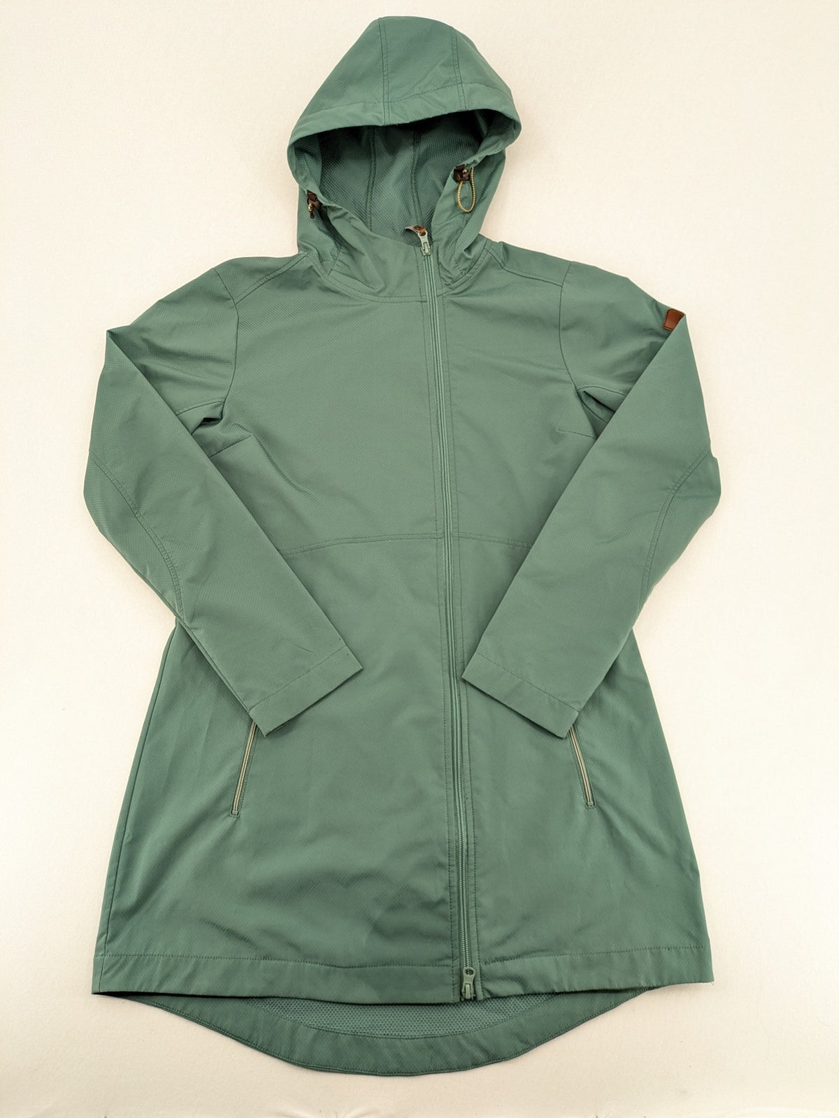 Frilufts green softshell jacket with hood, longline design, durable zipper, practical zip pockets.