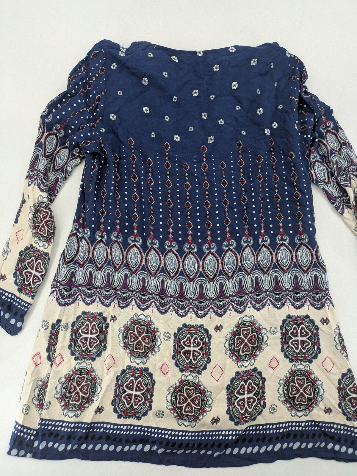 Uğurlar Collection multi tunic dress with vibrant Boho-Ethno pattern and V-neck tassel detail.