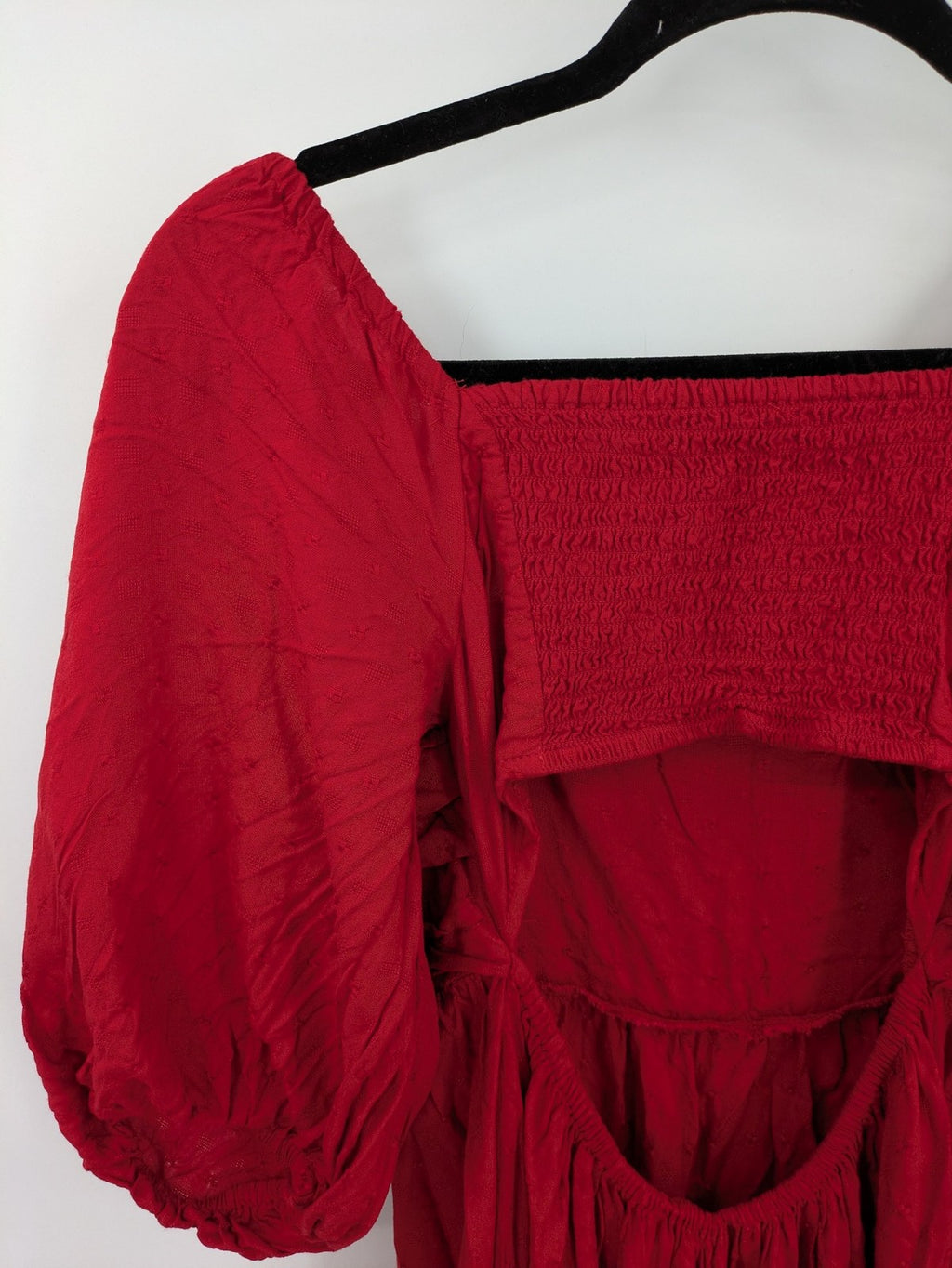 NEXT red midi dress with puff sleeves, smocked bodice, and stylish back cut-out.