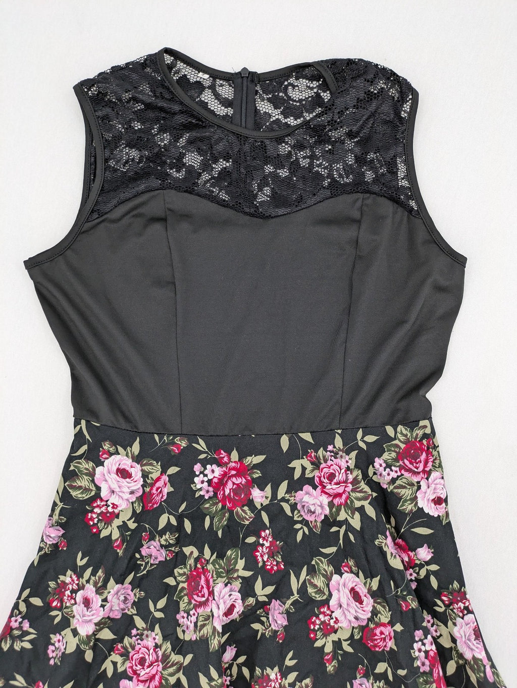 M/L black A-line dress with floral skirt and lace trim details.