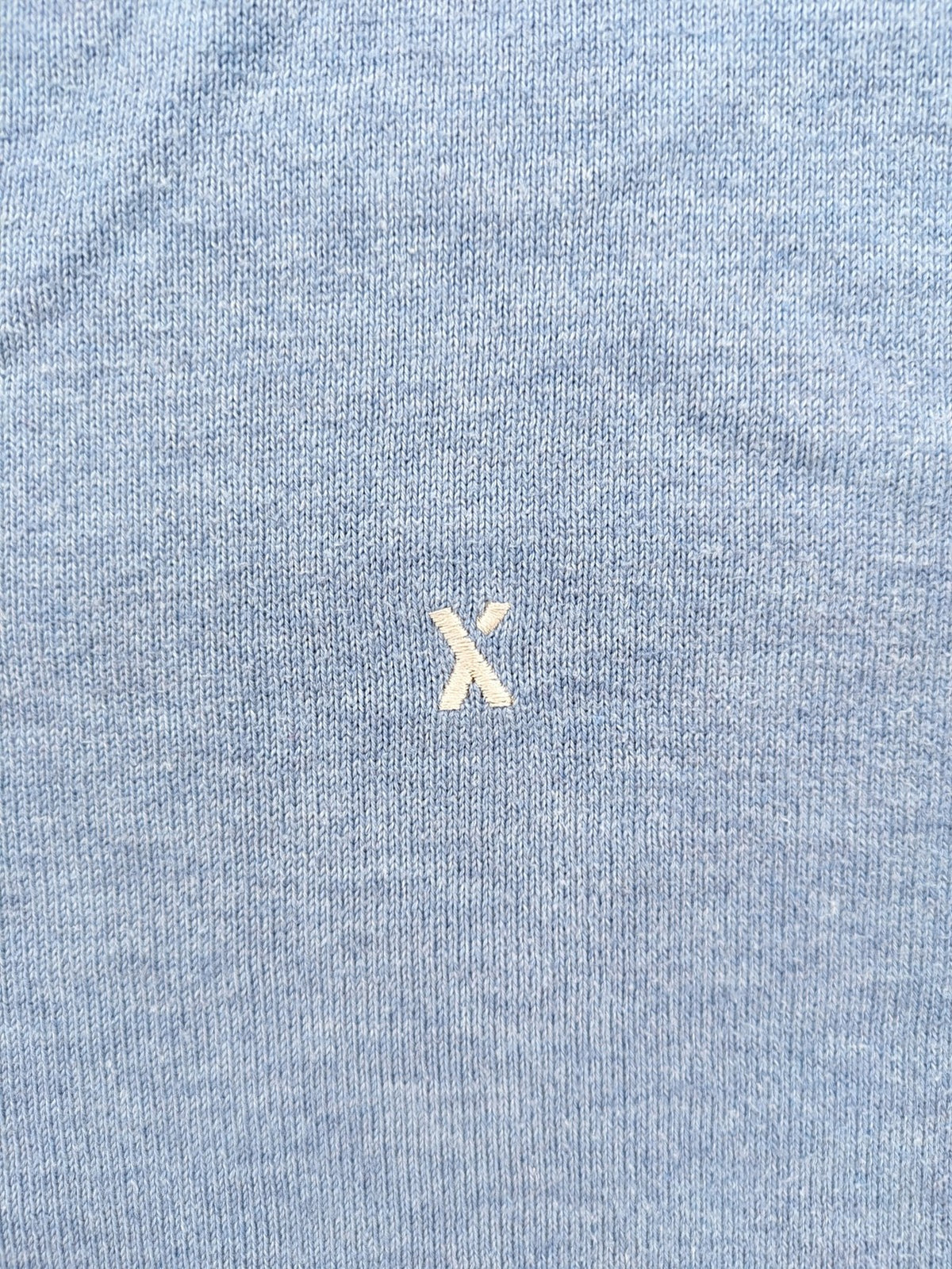 BRAX blue turtle neck jumper with V-neck and subtle "X" logo embroidery.