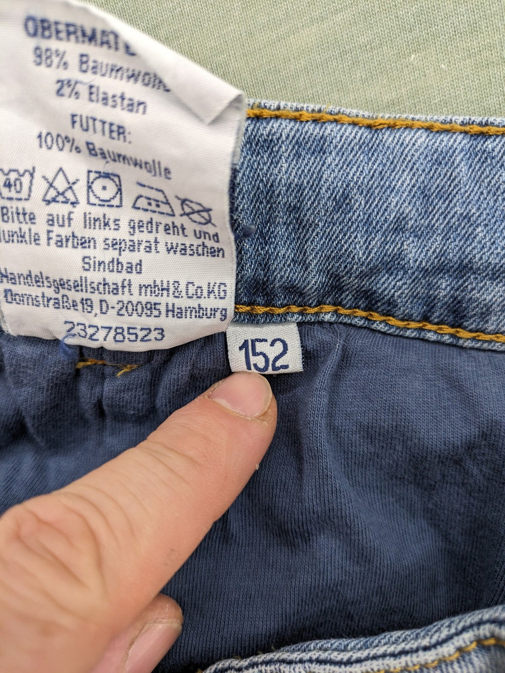 Alive blue straight jeans with classic cut, durable cotton-elastane blend, and button closure.