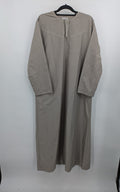 Aleasha beige kaftan thobe long sleeve with subtle embroidery and side pockets.