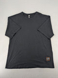 Smilodox black T-shirt minimalist design with subtle brand patch, 100% cotton.