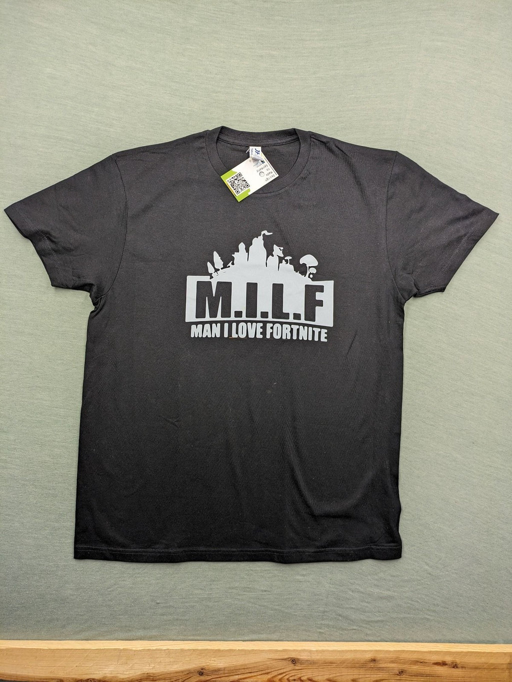 Fortnite black t-shirt with white "M.I.L.F. Man I Love Fortnite" graphic print.