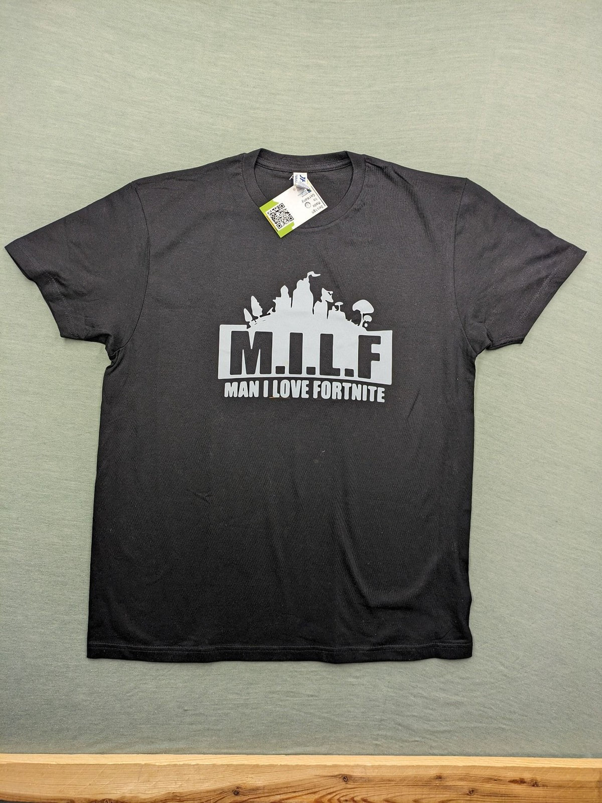 Fortnite black t-shirt with white "M.I.L.F. Man I Love Fortnite" graphic print.